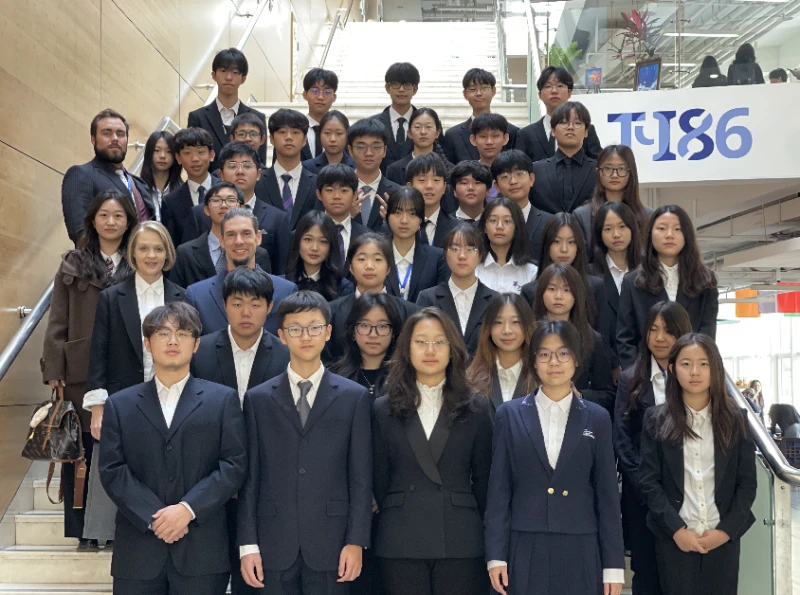 Yantai MUN students lined up on the stairs in Tianjin