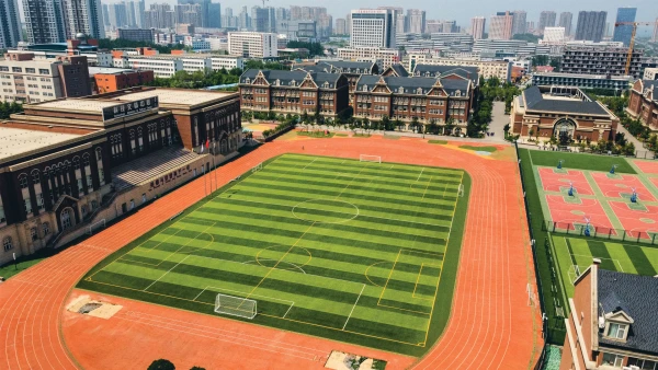 yantai huasheng international school campus grounds aerial view of track and field