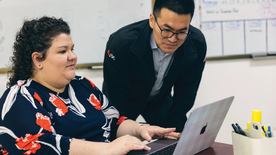 two teachers looking up the yantai huasheng international school address